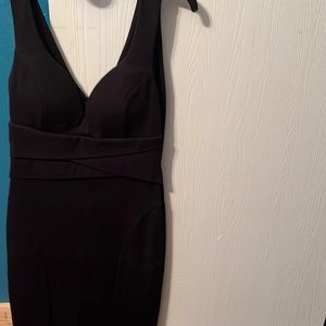 Like new size large black knee s length or a little above the knee dress